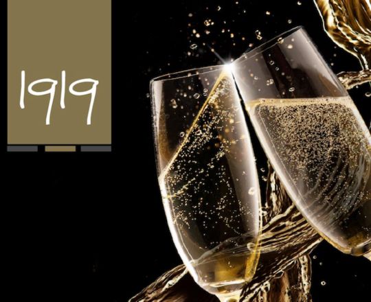 champagne flutes in black background