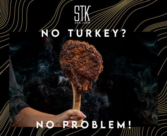 stk table with steak plate, sauces, and sliders.